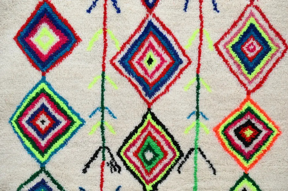 DecorBites™ moroccan handmade traditional azilal rug with vibrant multicolored diamond motifs on off-white background