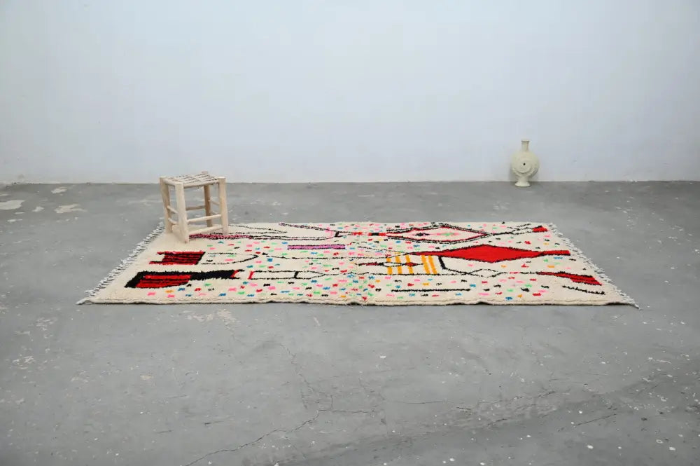 Beige moroccan handmade traditional azilal rug with bold red black yellow geometric patterns and multicolored dots 270 x 157 cm