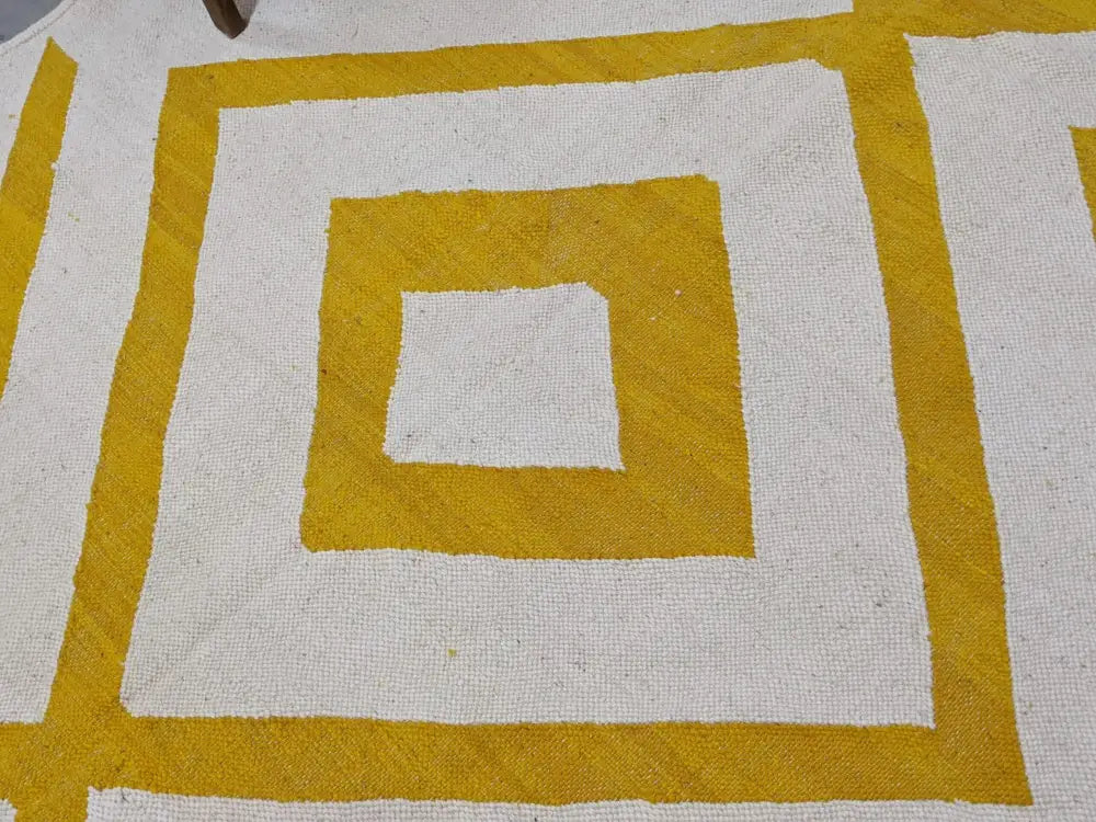 DecorBites™ moroccan handmade traditional azilal rug in white and mustard yellow with a bold concentric square pattern