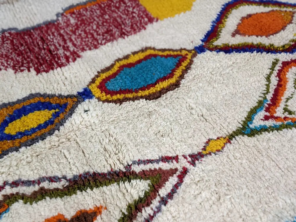 Decorbites™ moroccan handmade traditional azilal rug in off-white with vibrant geometric patterns hand-knotted texture