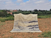 Beige and gray striped beni mrirt rug with textured hand-knotted design from decorbites moroccan handmade collection