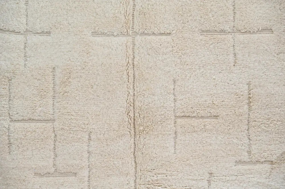 Cream-colored plush beni ouarain carpet with textured geometric cross pattern moroccan handmade 300 x 205 cm