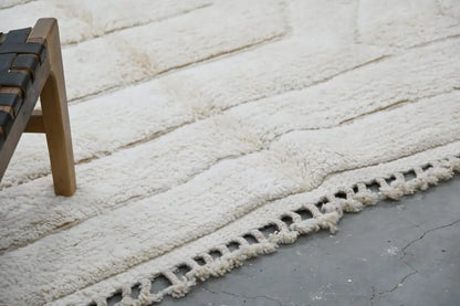 Cream-colored plush shag beni ouarain rug with textured woven fringe from DecorBites™ Moroccan handmade collection