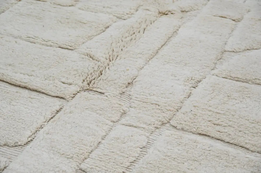 Off-white plush moroccan handmade beni ouarain rug with a textured blocky pattern by DecorBites 285 x 210 cm
