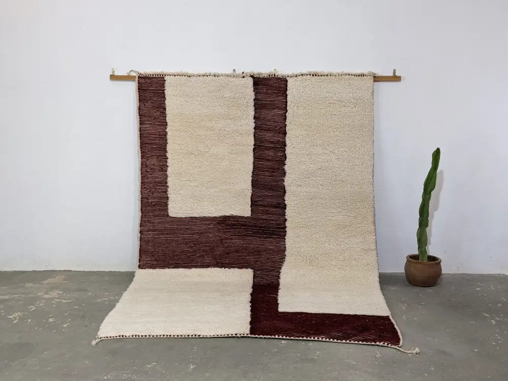 Cream and deep burgundy geometric wool rug with textured handwoven design beni ouarain moroccan handmade beni ouarain rug