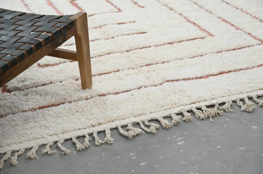 DecorBites moroccan handmade beni ouarain rug in cream wool with geometric red lines and fringed edges 302 x 200 cm