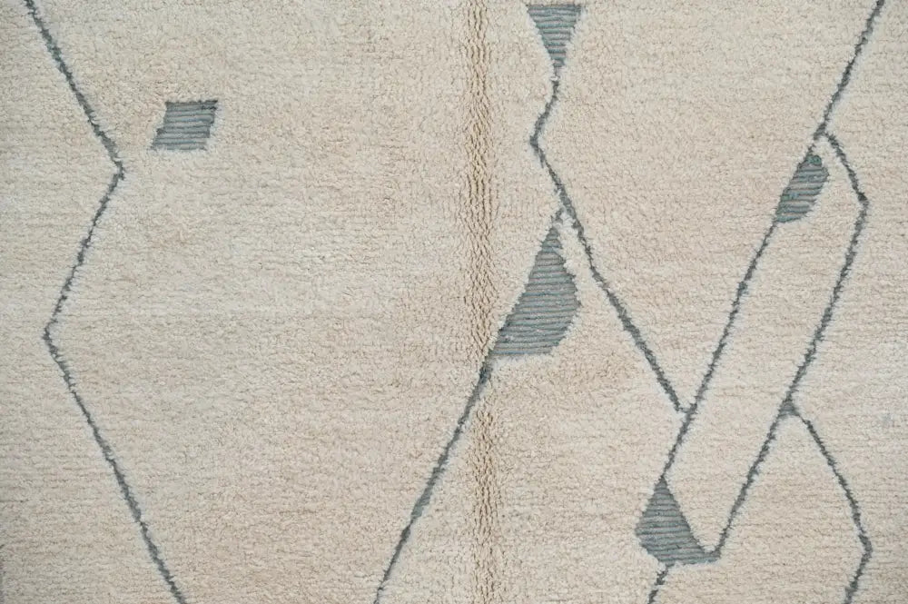Beige wool beni ouarain rug with geometric gray and tan patterns moroccan handmade traditional beni ouarain rug