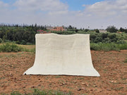 Off-white textured moroccan handmade beni ouarain rug with soft plush woolen surface and slightly frayed edges 464 x 360 cm