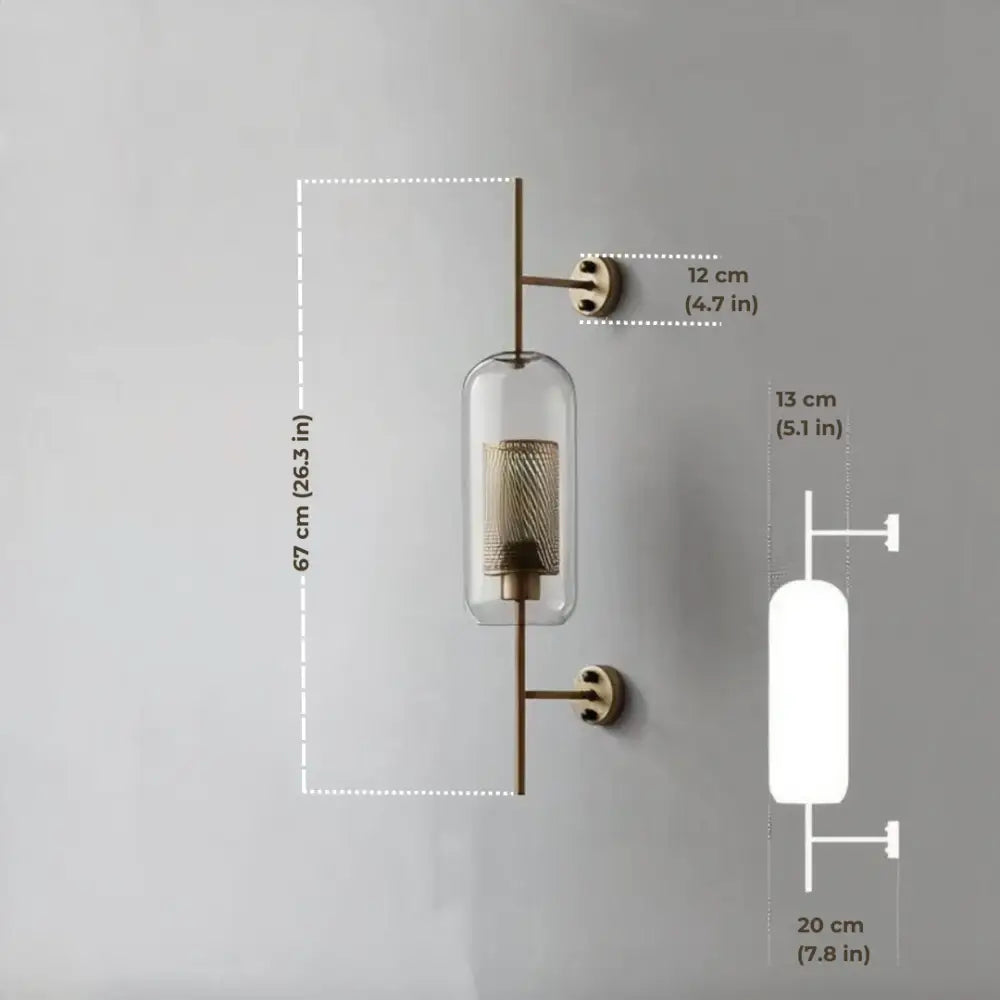 DecorBites™ modern bathroom wall sconce with brass finish clear glass cylinder and intricate mesh interior design