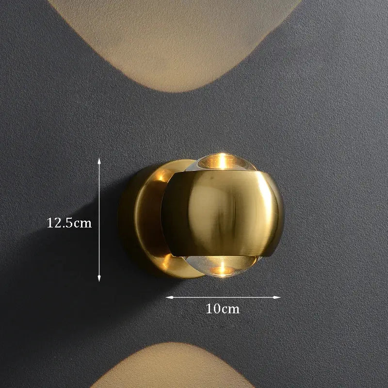 DecorBites™ Moroccan modern black brass LED wall lamp with gold-finished spherical sconce and integrated glass element