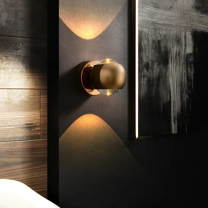 DecorBites™ Moroccan modern black brass led wall lamp with a sleek spherical brushed brass led wall design casting warm light
