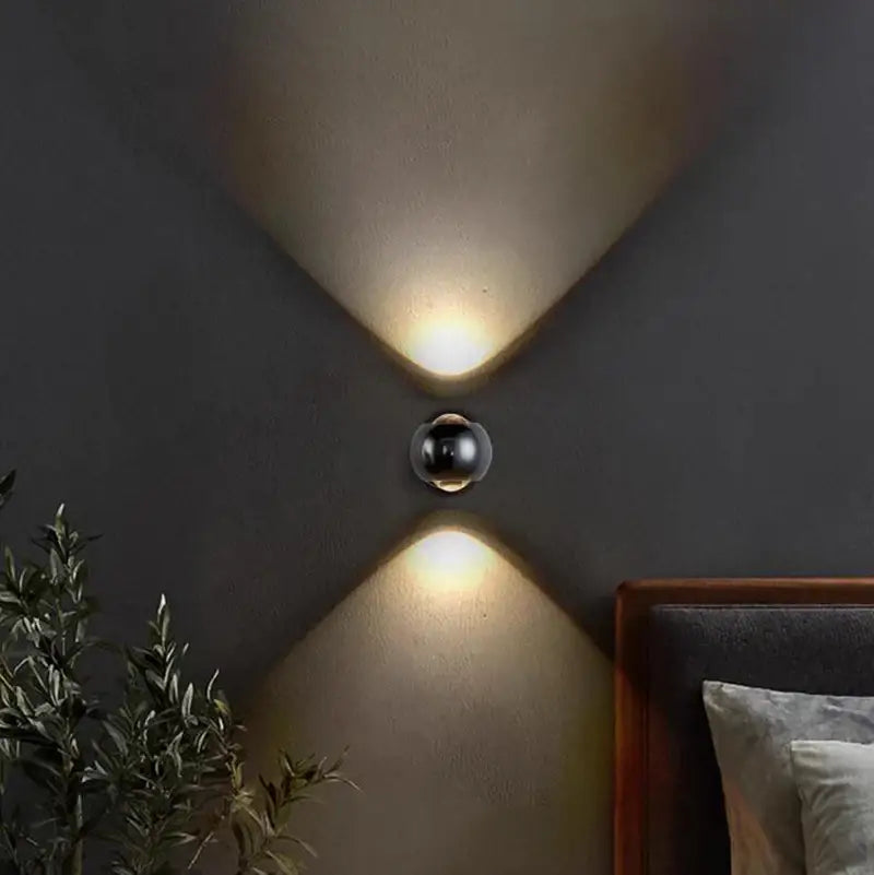 Modern black spherical brass led wall sconce with two angled lights warm illumination decorbites™ led wall lamp