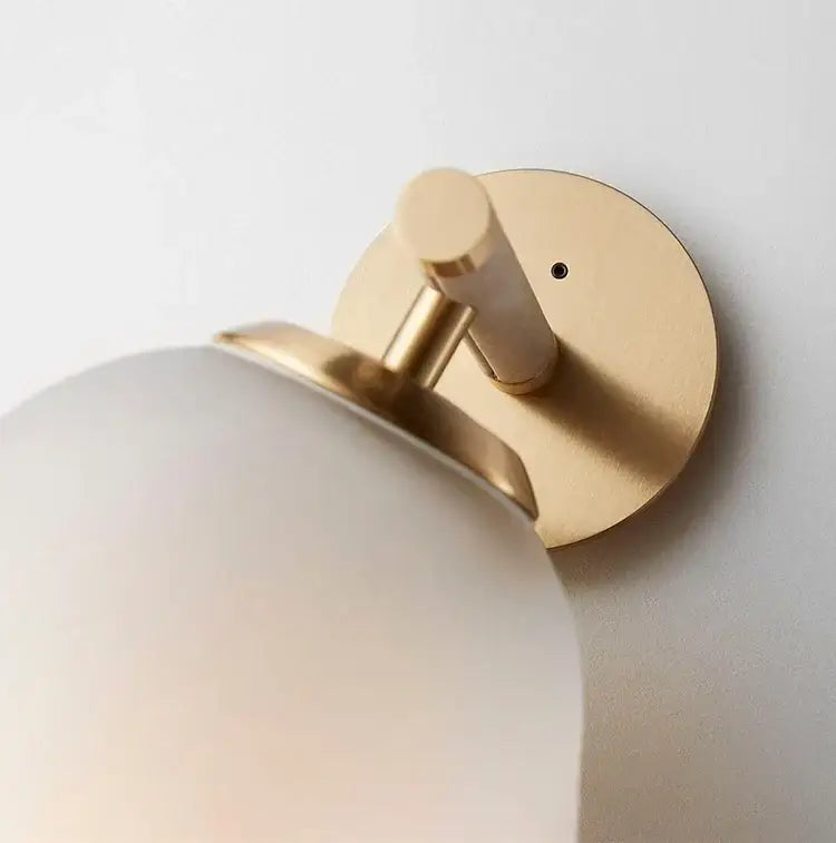 Decorbites™ moroccan sleek glass wall sconce with gold-toned frosted globe and brushed brass mount for energy-efficient led bulbs