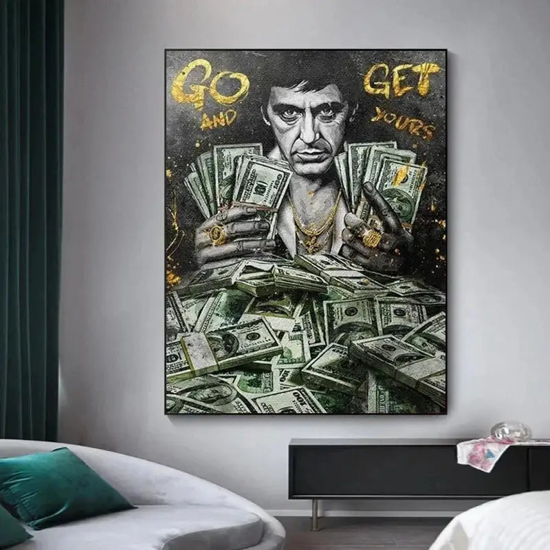 Black-and-gold framed canvas print featuring a stylized portrait of scarface tony montana holding stacks of us currency