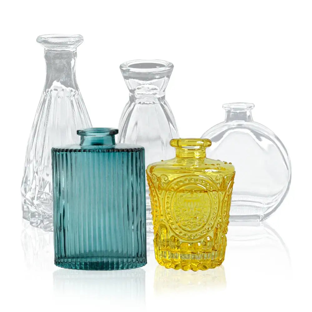 A vibrant yellow glass vase with intricate embossed detailing and a 2cm opening ideal as a flower pot or decoration