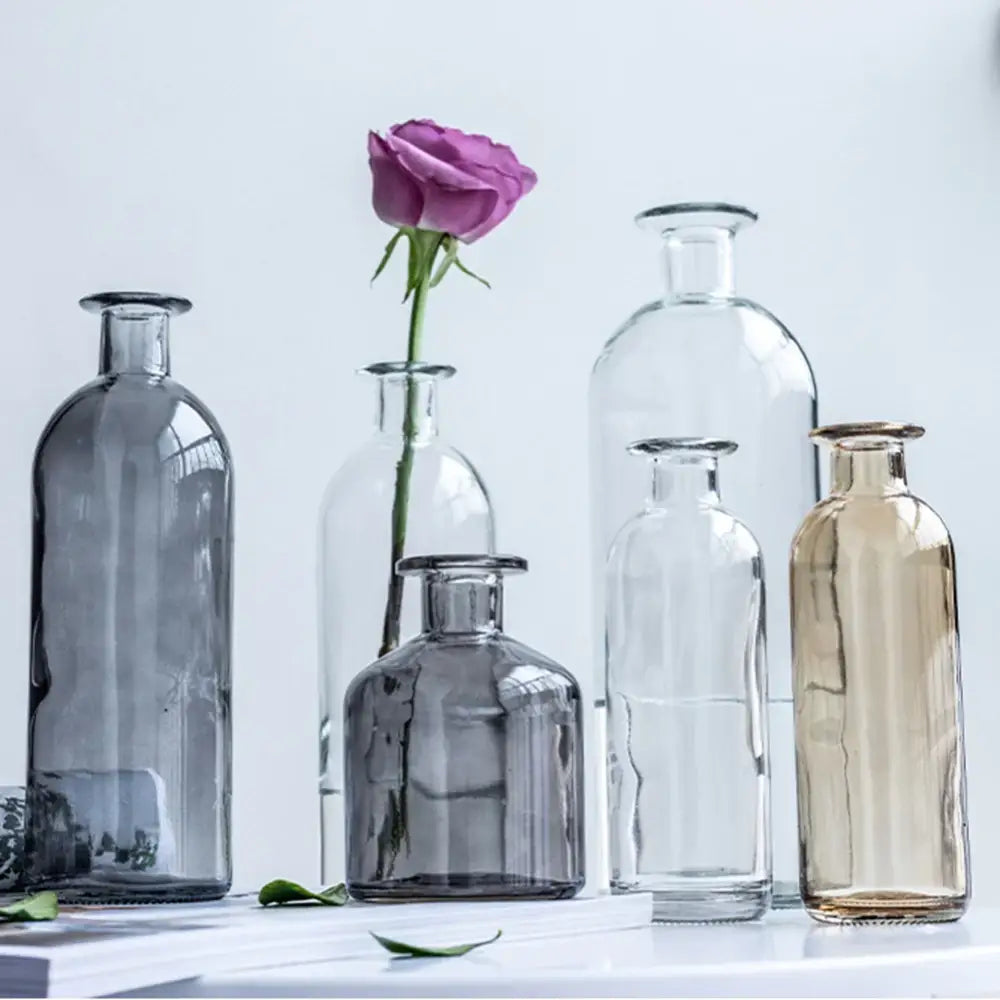 A single purple rose in a multicolor DecorBites™ glass vase with a 2cm opening and rounded shoulders flower pot
