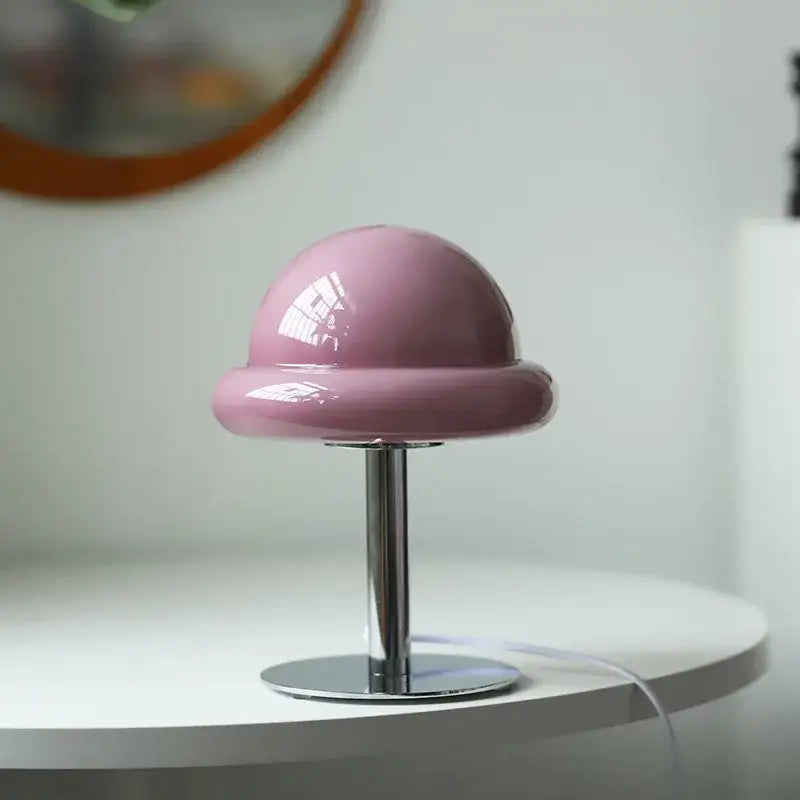 A sleek glossy pink mushroom table lamp with chrome stem and base from DecorBites bauhaus furniture