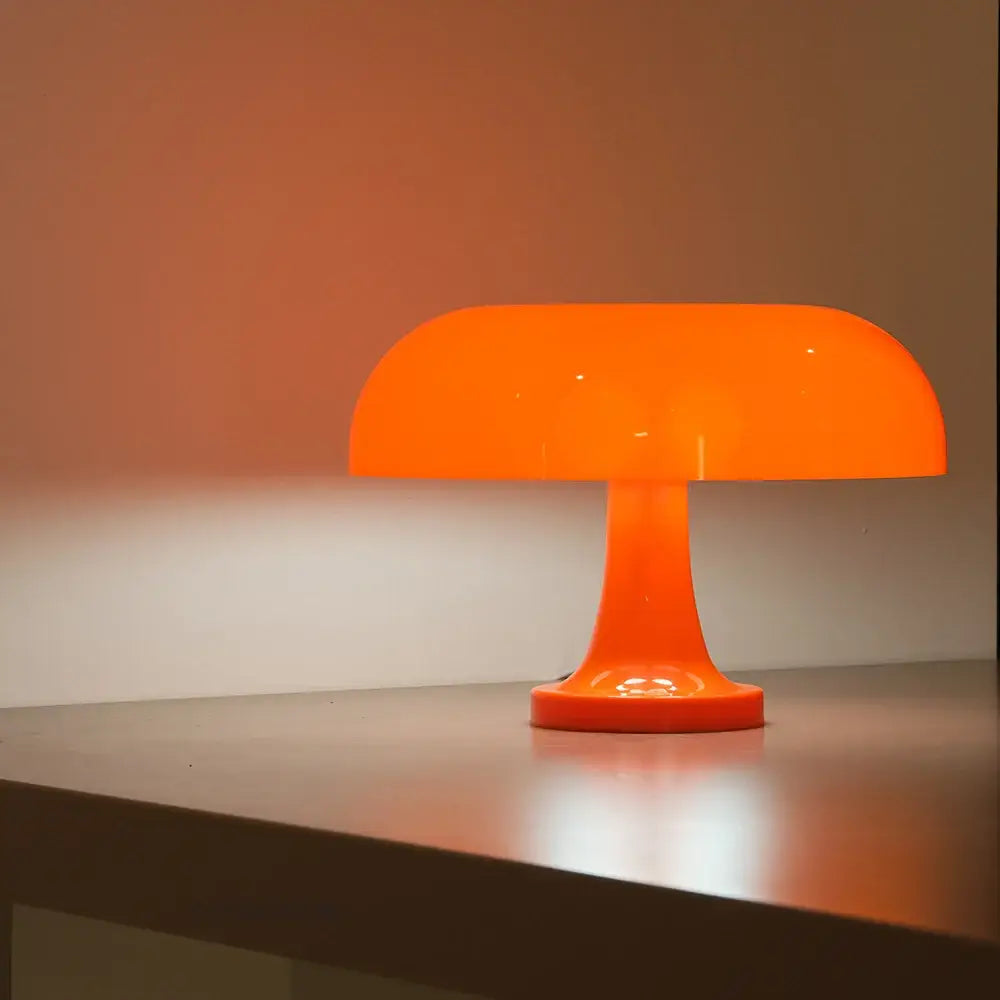 Vibrant orange DecorBites™ mushroom table lamp with glossy translucent acrylic body and usb plug for bedroom use