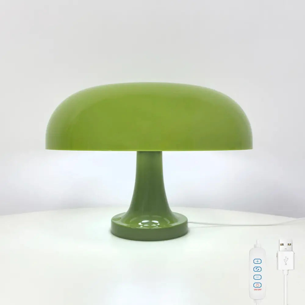 A sleek olive-green mushroom table lamp with glossy finish and usb plug for minimalist modern bedroom decor