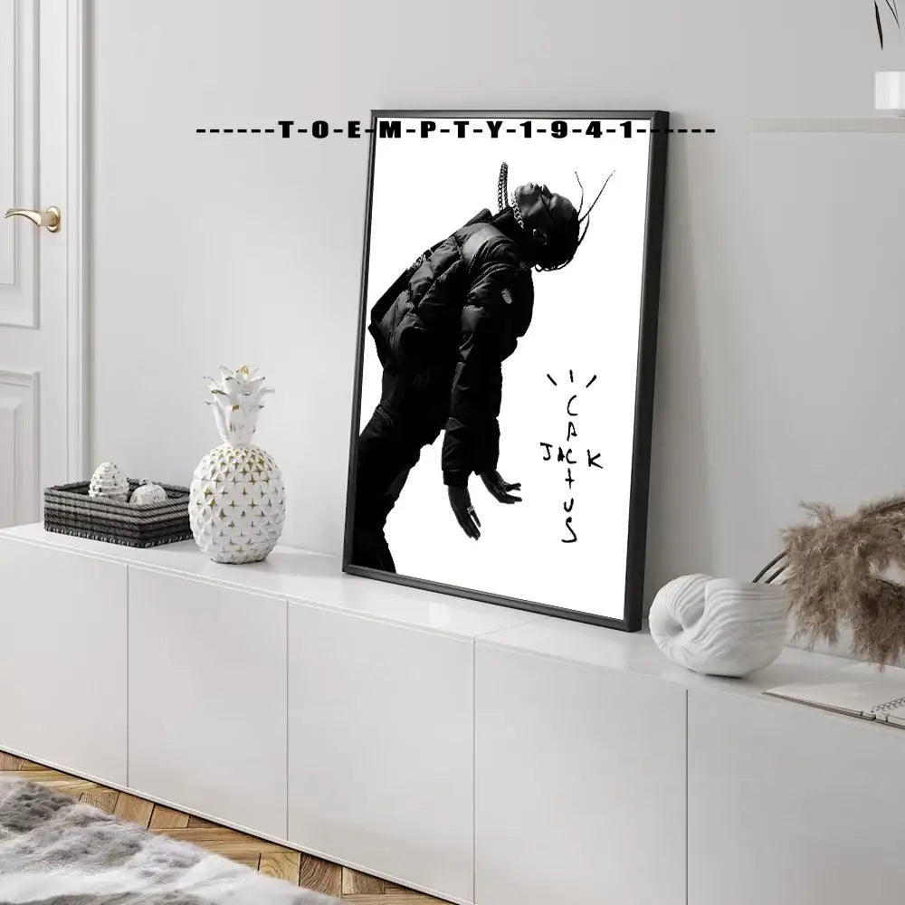 Black-framed black-and-white cactus jack music album covers poster featuring travis scott silhouette in puffer jacket