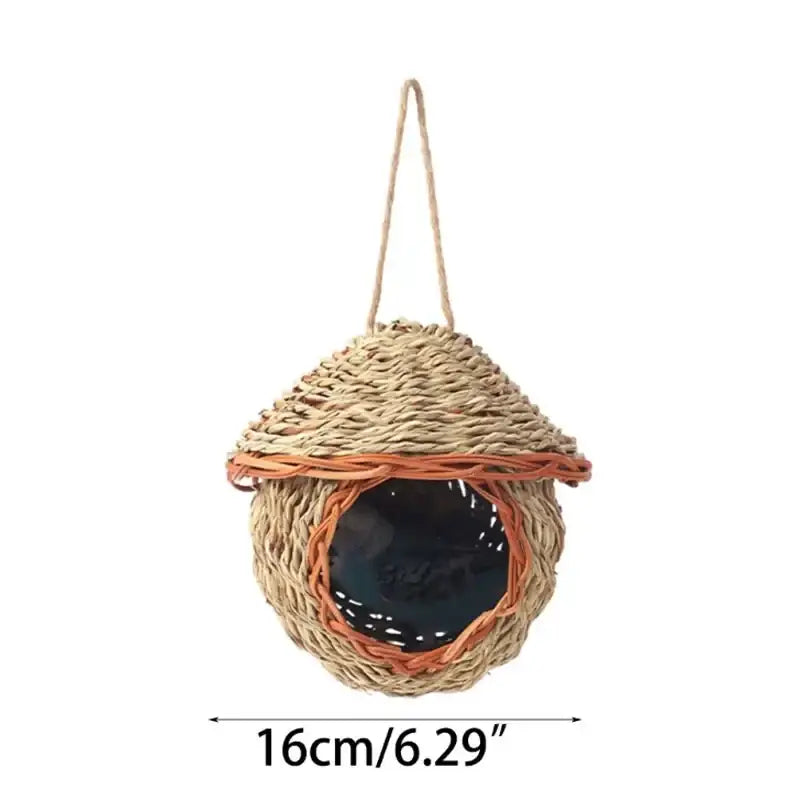 DecorBites™ natural grass bird cage with woven rounded body, orange trim, and hanging rope for style birds nest decor