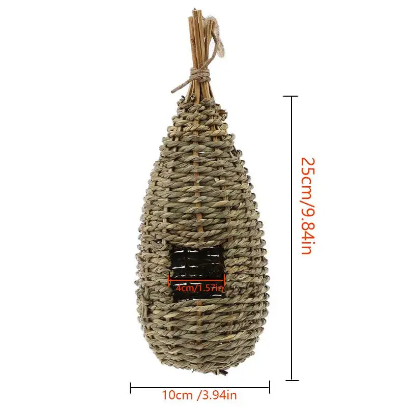 DecorBites™ natural grass bird cage with handwoven rustic textured weave and dark rectangular parrot nest entrance