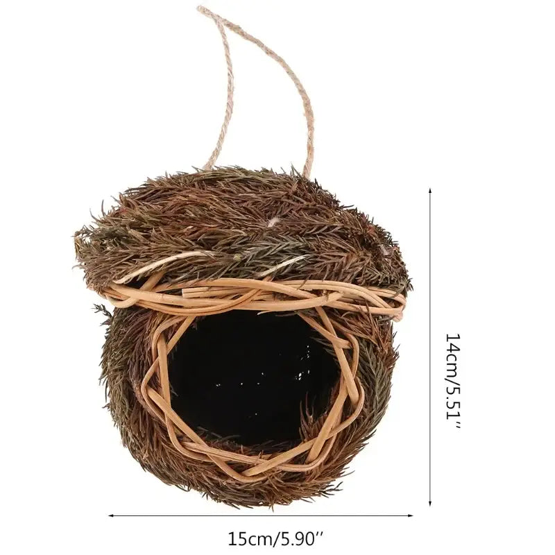 Handwoven natural grass bird cage shaped like an acorn with woven twig rim and hanging twine for parrot nest use