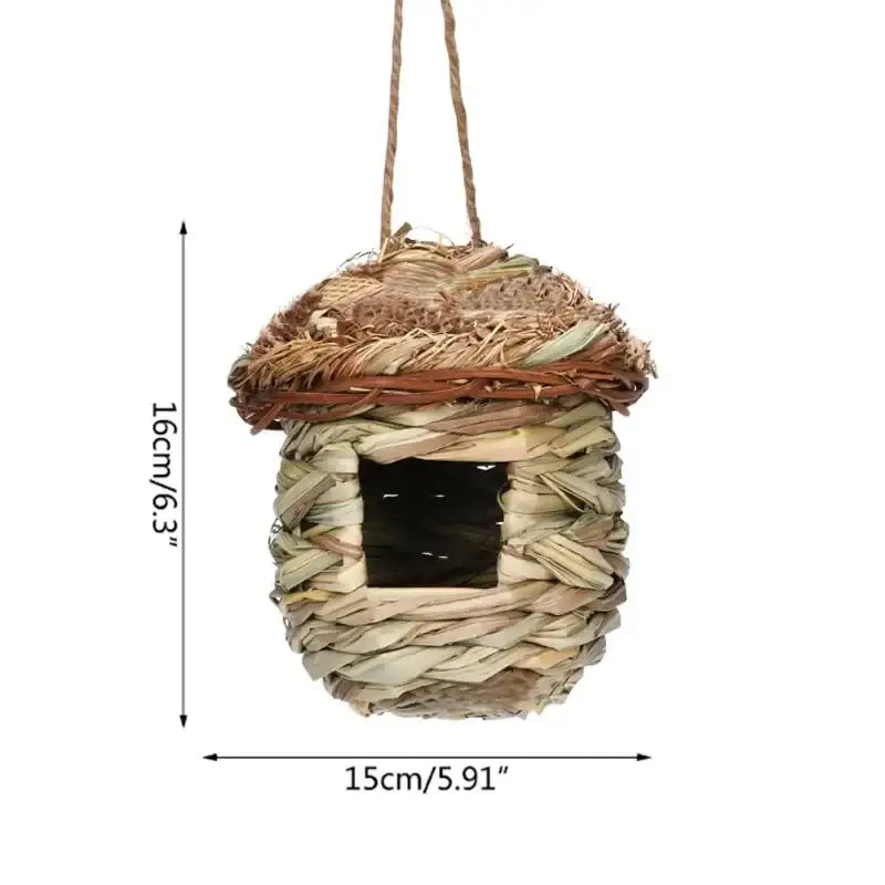 Handwoven DecorBites™ natural grass bird cage shaped like an acorn with a rustic brown roof for use as a parrot nest