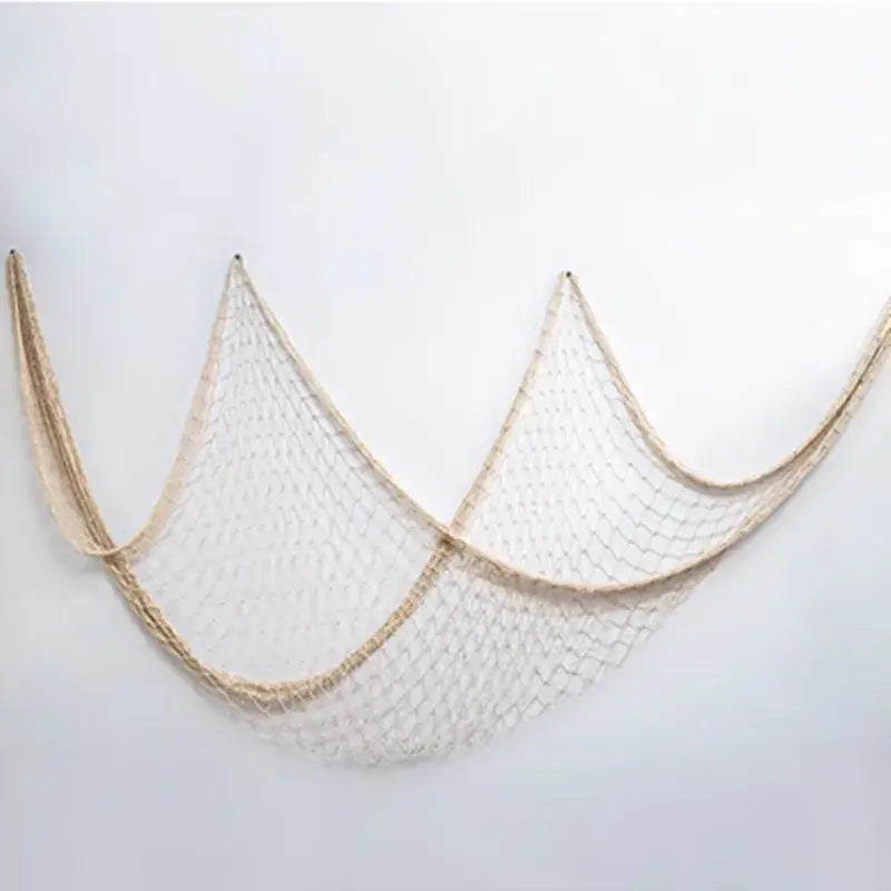 Beige fishing net decoration with woven mesh pattern and natural fiber edges for nautical theme wall decor