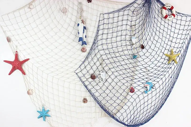 DecorBites™ nautical theme wall decor features a blue and white fishing net decoration with colorful starfish seahorses and a life preserver
