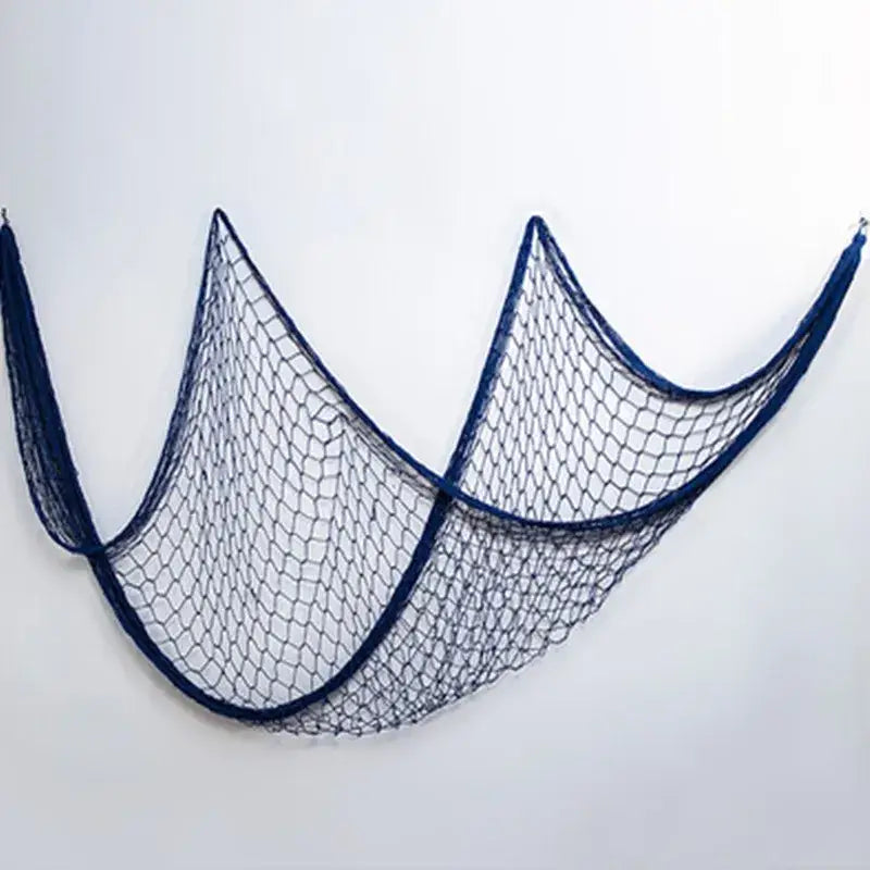 Decorbites™ nautical theme wall decor featuring a dark blue fishing net with hexagonal mesh and reinforced edges