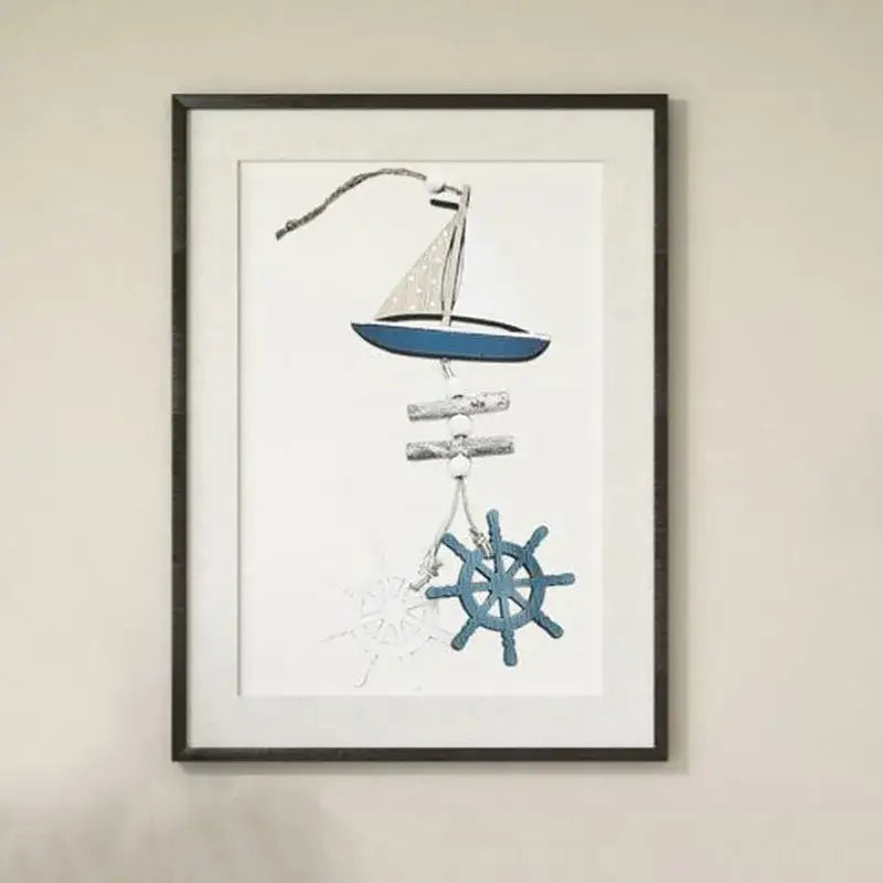 Decorbites™ nautical theme wall decor featuring a blue sailboat with polka-dot sails, rustic wood, and teal ship’s wheel fishing net decoration