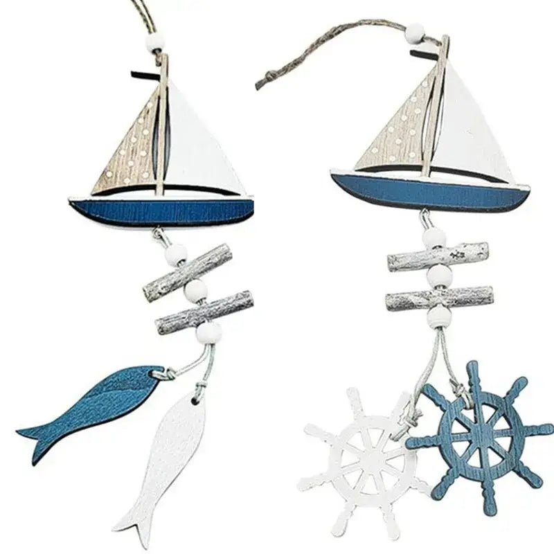 Decorbites™ nautical theme wall decor featuring wooden sailboat ornaments with blue white sails and fishing net accents