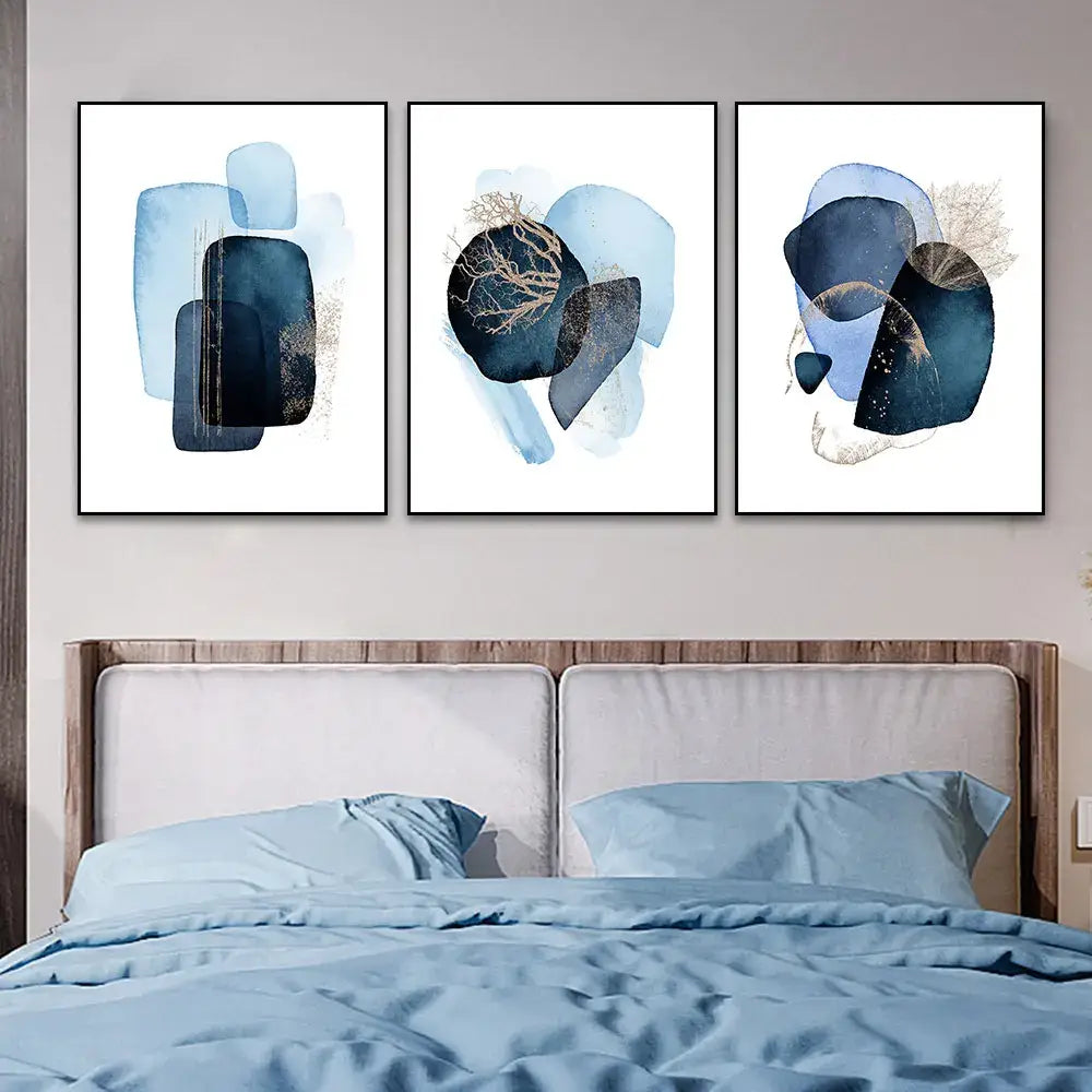 DecorBites™ navy blue geometric wall art set featuring three framed abstract pieces with layered shapes and gold leaf accents