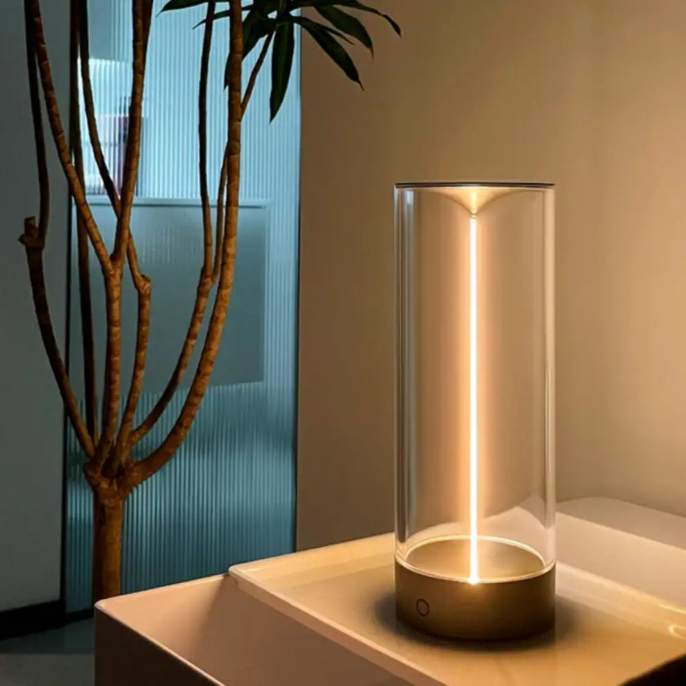 Decorbites™ nordic sleek cylindrical glass table lamp with warm golden light and metallic base battery operated table lamp