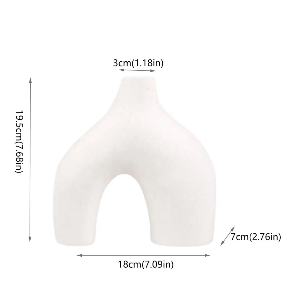 DecorBites™ nordic ceramic flower vase in white with a smooth matte finish and asymmetrical u-shaped design for home decor