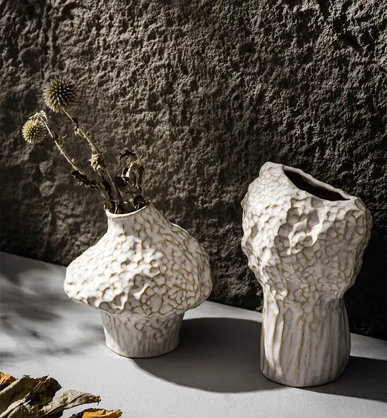 Two off-white nordic ceramic vases with textured organic surfaces in the DecorBites™ nordic ceramic vase with pampas grass set