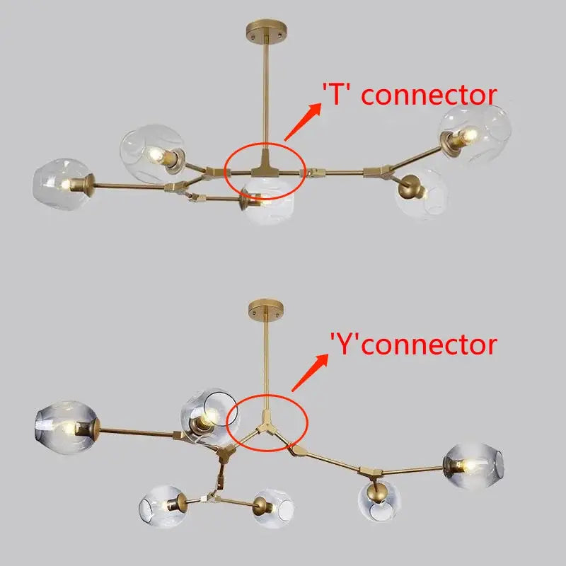 Modern brass nordic chandelier with clear glass globe shades ideal for dining and living rooms by DecorBites