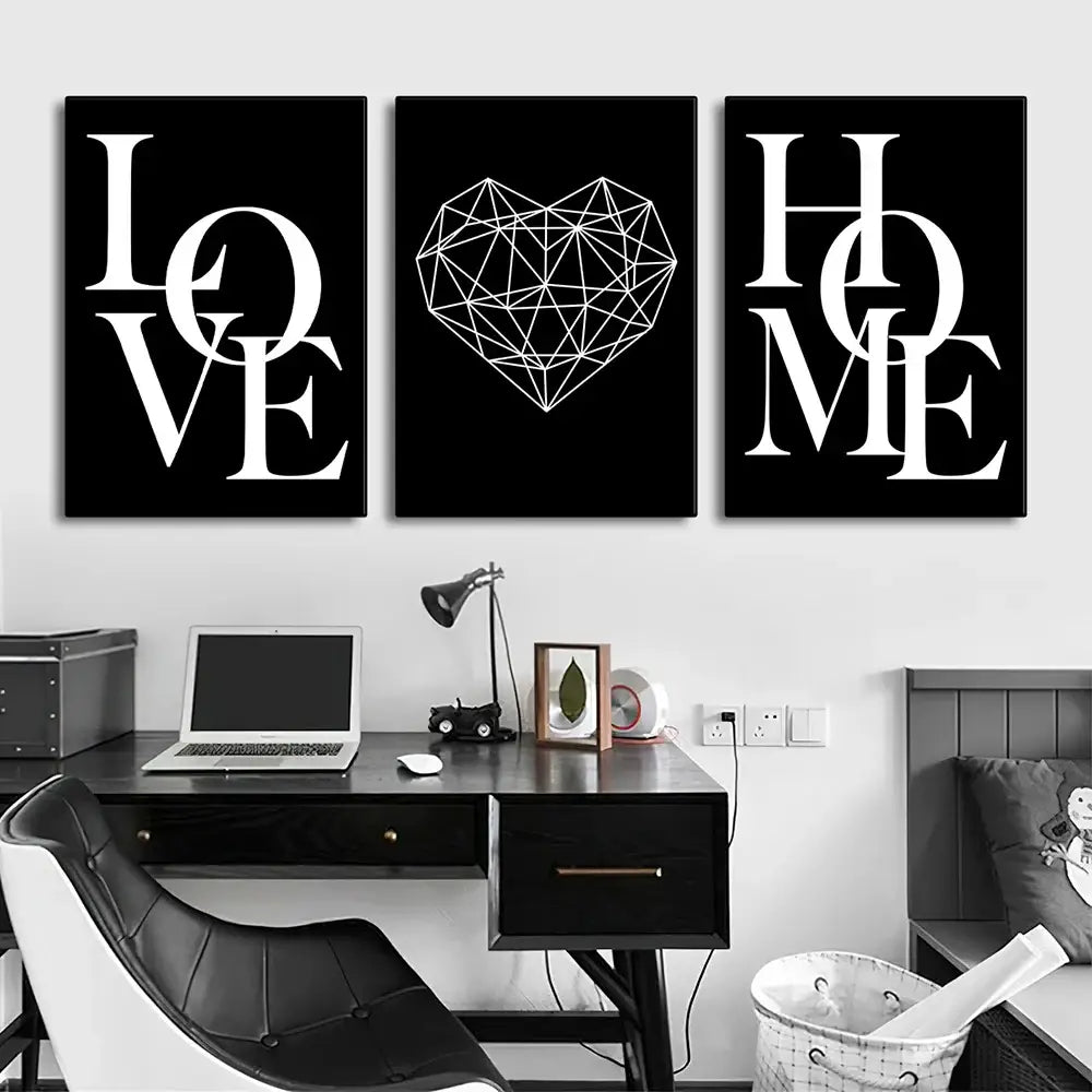Black and white canvas prints set featuring nordic diamond heart and bold love and home lettering by decorbites