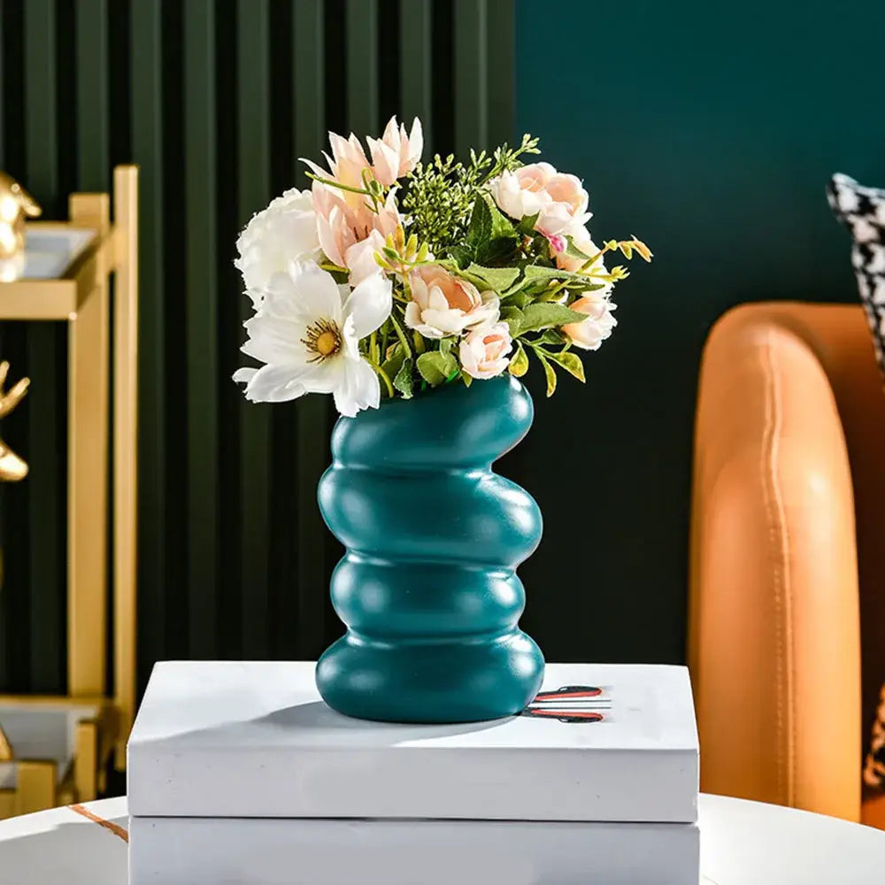 Teal ceramic DecorBites Nordic flower vase with wavy segmented design for modern home decor display