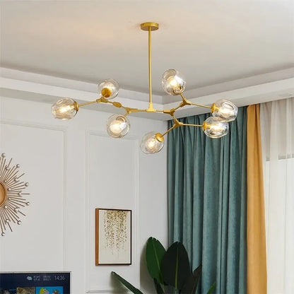 Gold-toned decorbites™ nordic glass ball led chandelier with clear globe bulbs and branching metal frame in black gold