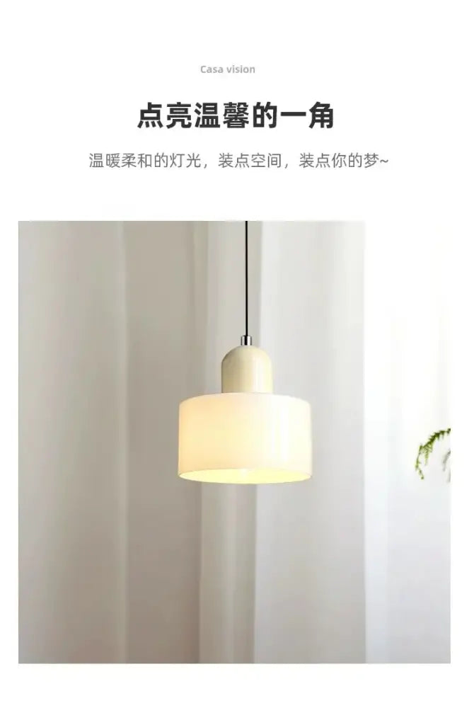 Cream-colored cylindrical glass chandelier with minimalist design and soft glow for bedroom and bar by DecorBites™ Nordic glass chandelier