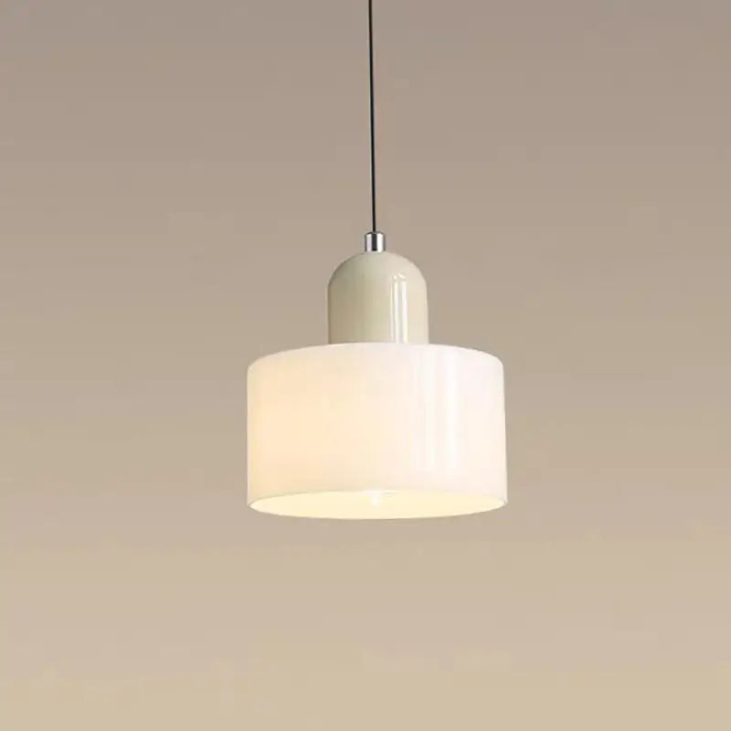Cream-colored nordic glass chandelier pendant light with sleek cylindrical shade and metallic fixture for bedroom and bar