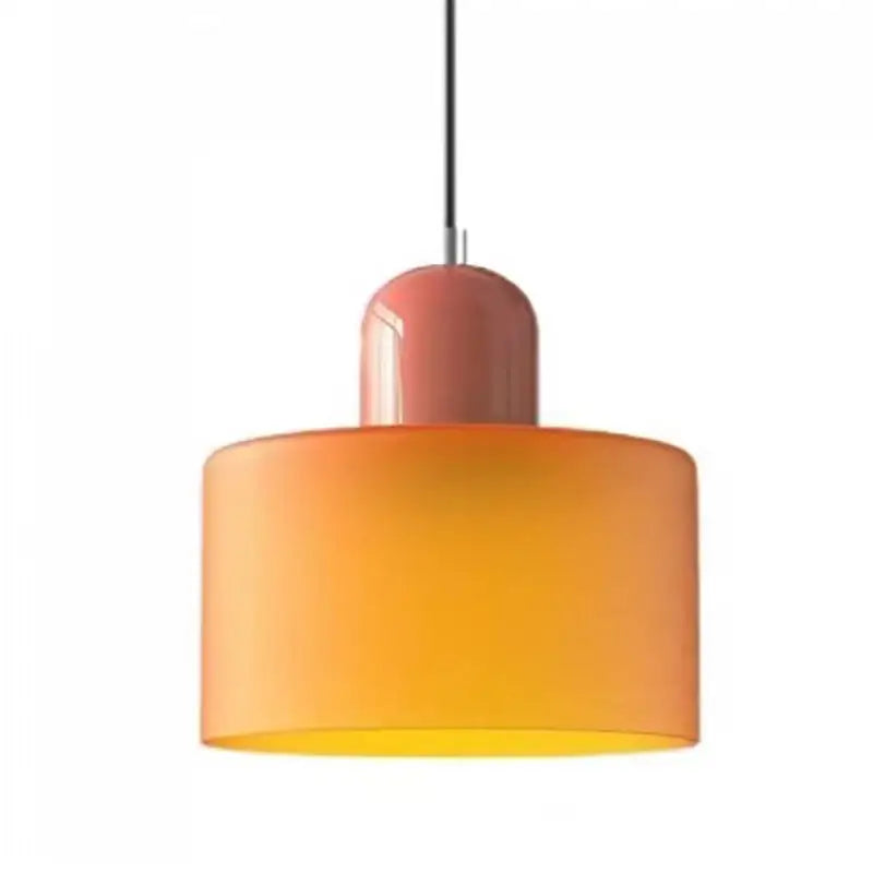 A modern nordic glass chandelier with a cylindrical gradient orange glass shade and matte pink metallic top for bedroom and bar