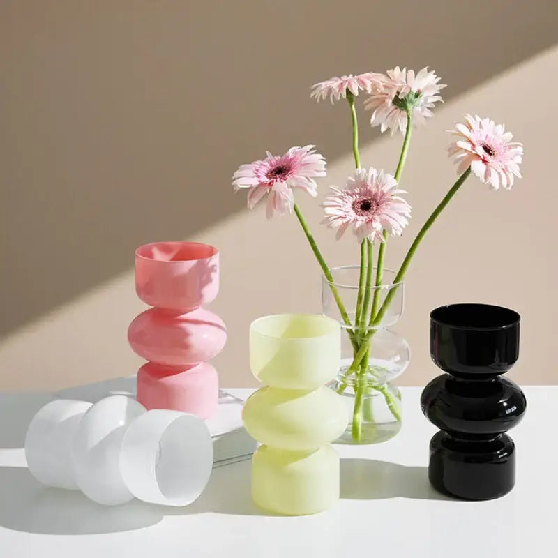 A sleek glossy black glass vase with stacked rounded segments for vase home decor by decorbites nordic collection