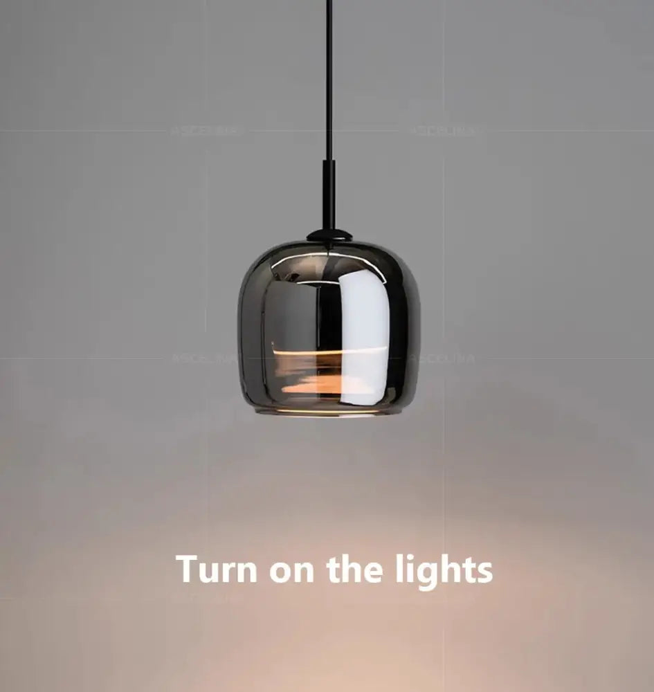 Decorbites™ nordic glass led pendant chandelier with a glossy black glass globe and thin black cord for modern luxury lighting