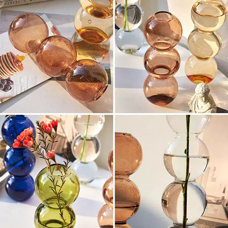 Stacked decorbites™ nordic glass vases in amber, blue, and green hues with smooth rounded spheres for home decoration gift