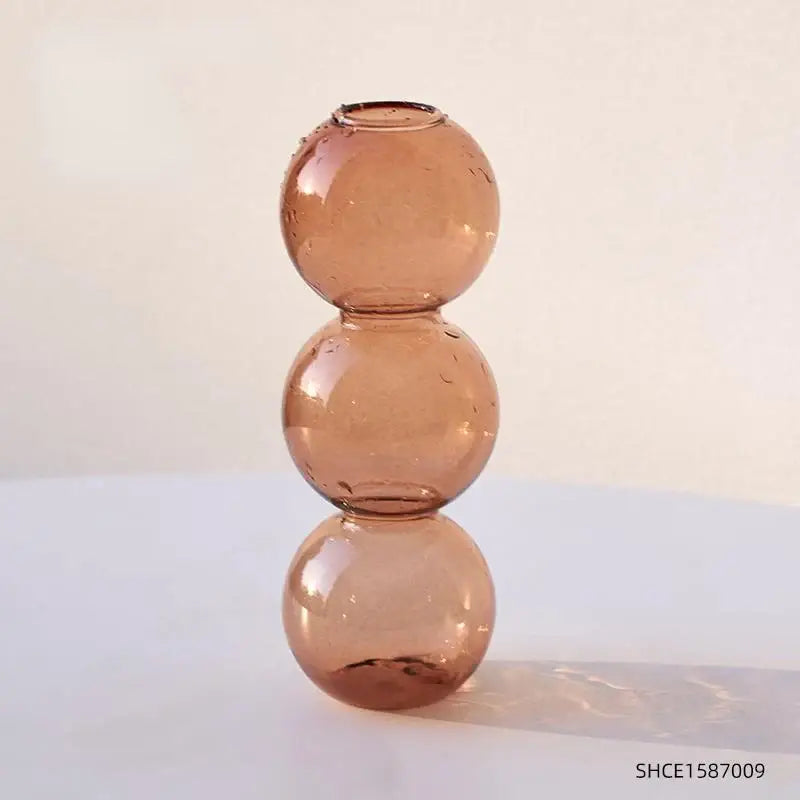 DecorBites™ nordic glass vase in translucent amber with three stacked spherical sections for home decoration gift