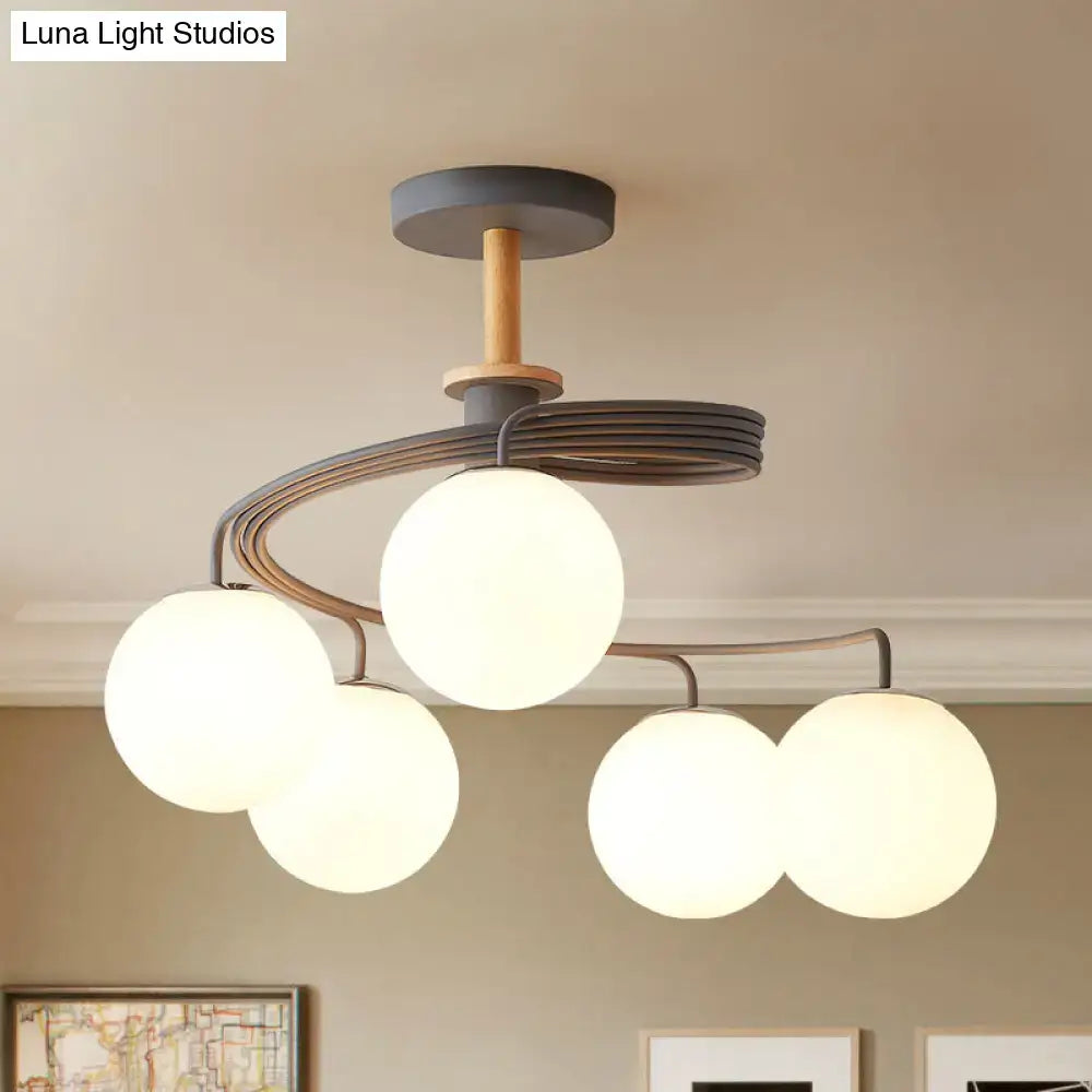 DecorBites Nordic iron swirl flush chandelier with five orb glass shades, grey green metal, and wood semi flush ceiling light