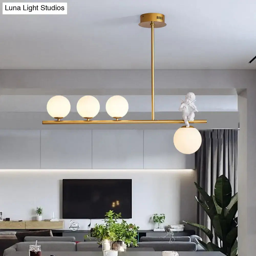 Decorbites nordic island angel pendant light with gold-tone frame, opaline glass shade, and white cherub figurine